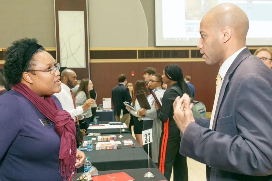 Student speaking with law school representative